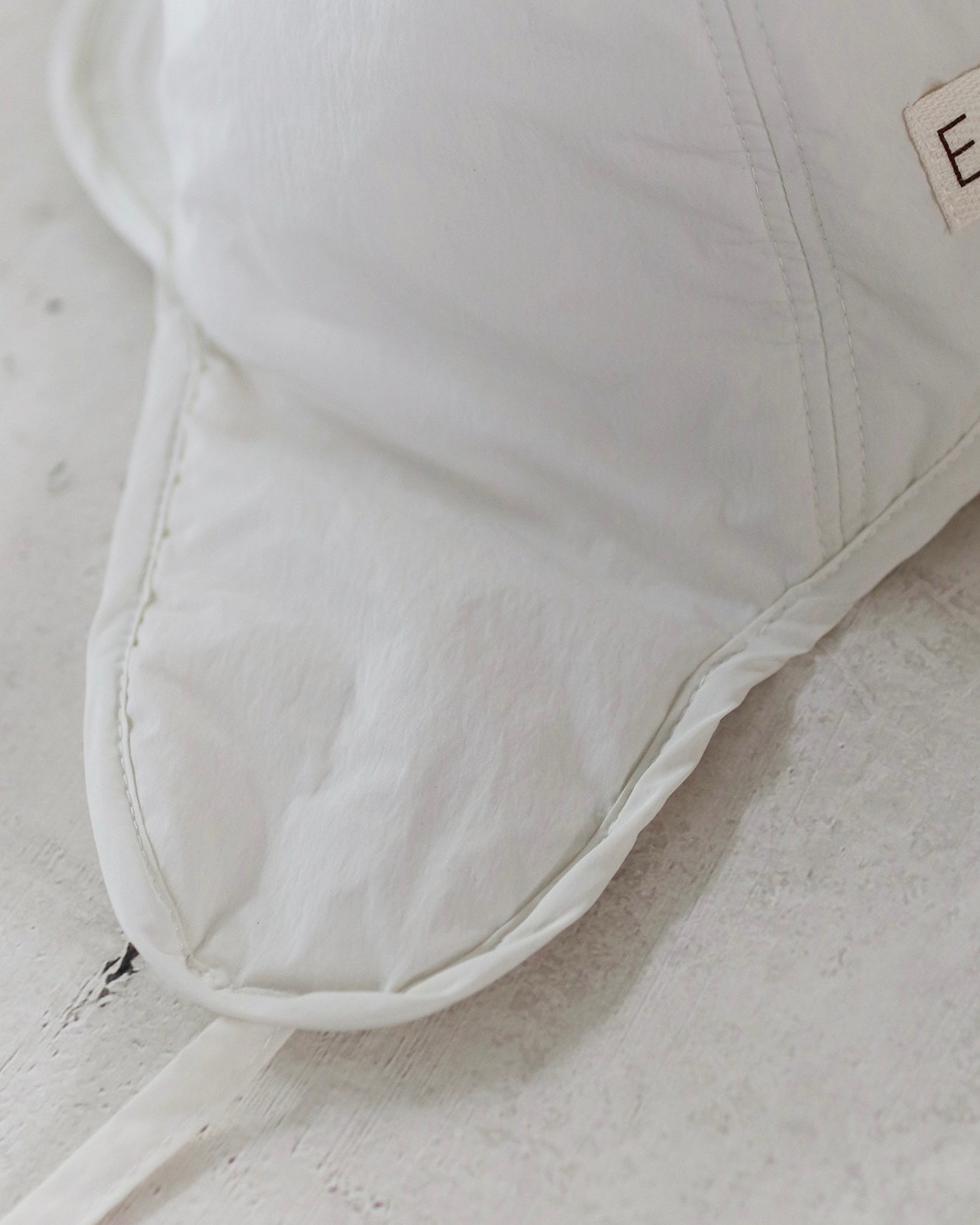 Ear muff cap - Cream [EARTH THE ARCHIVE] (26AW)